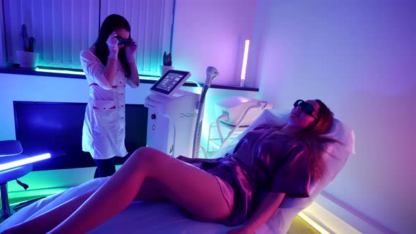 Epilation in Modern Cosmetological Office Aesthetician is Using IPL Technology for Hair Removal From