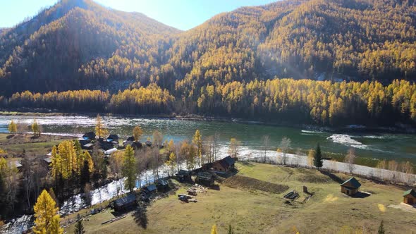 a Village in the Taiga on the Banks of the Russia River