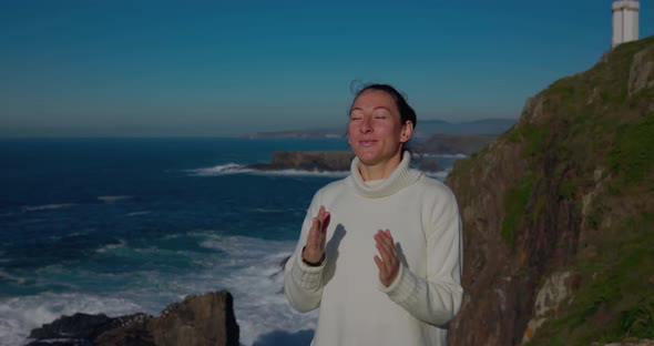 The Girl Breathes Meditates on the Ocean