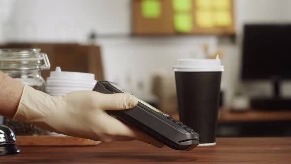 Paying with Credit Bank Card in Cafe