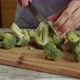 Chef Using a Knife Cutting Fresh Raw Broccoli Cabbage - VideoHive Item for Sale