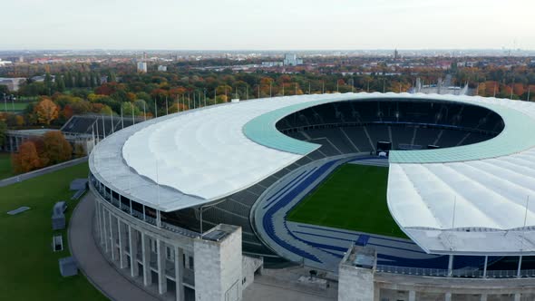 Majestic Olympia Stadium Entrance with View of Empty Grandstand Seating Row with No People