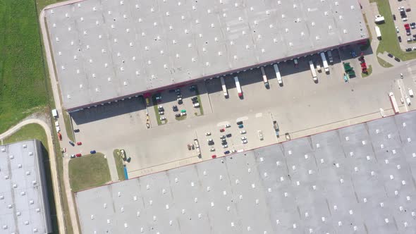 Aerial Shot of Logistics Center with Trucks
