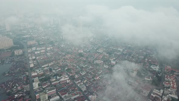 Aerial fog morning in Penang George Town city.