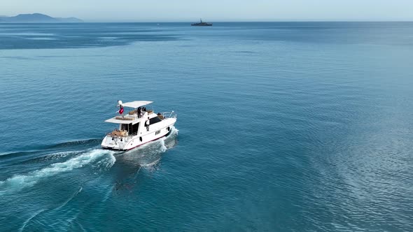 A couple rides a yacht aerial view 4 K Turkey Alanya