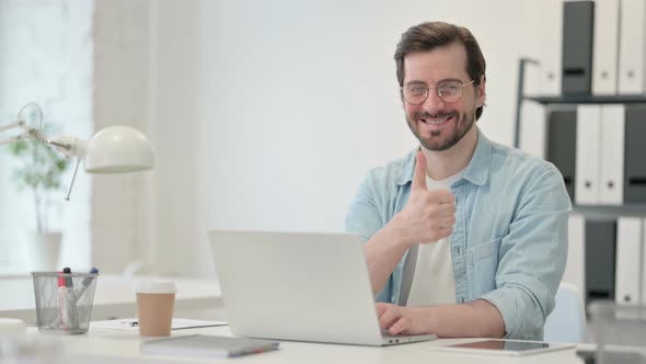 Thumbs Up By Young Man Laptop Work