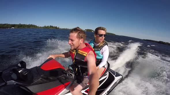 seadoo driver selfie him and passenger rough waves slow motion