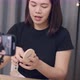Young Asian woman beauty blogger influencer makeup artist recording on smartphone. - VideoHive Item for Sale