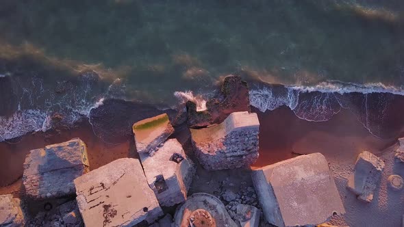 Aerial birdseye view of abandoned seaside fortification buildings at Karosta Northern Forts on the b