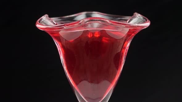 Tasty red jelly in bowl. red substance in a glass bowl