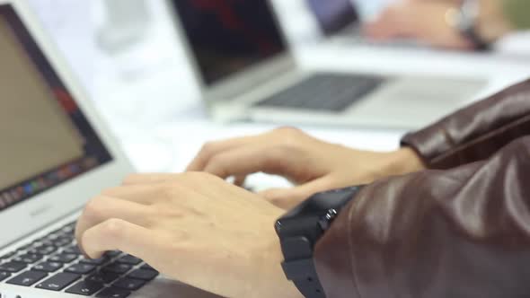 Woman Uses A Modern Laptop