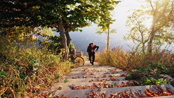 Sportsman Running Up Stairs in Nature