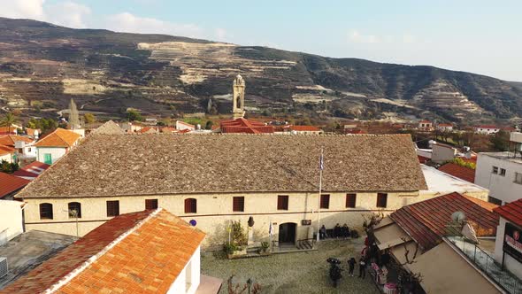 Drone Flying Over Holy Christian Monastery Towards Ancient Dome,  High Mountains Landscape In Backgr