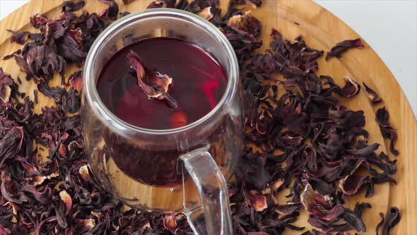 Red Tea in a Glass Cup on a White Background