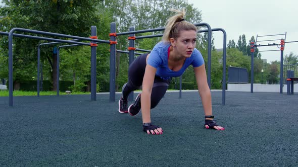 Fit Girl Doing High Plank and Knee Draws Outdoor
