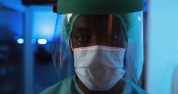 African man doctor at work inside hospital during coronavirus outbreak
