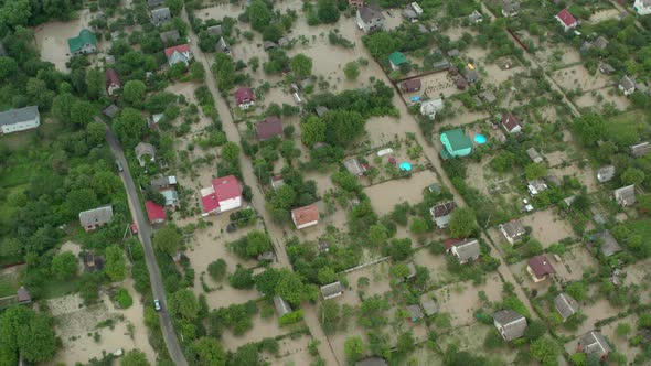 Aerial Drone View. Flooded Suburbs, Houses in the Water Depiction of Flooding Mudslide. Top View V4