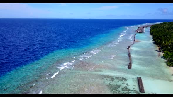 Aerial top view tourism of tropical lagoon beach adventure by turquoise lagoon with white sand backg