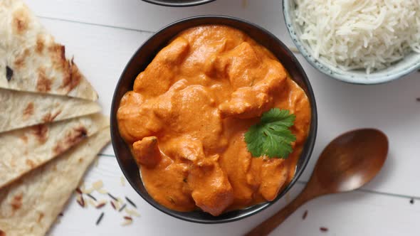 Fresh and Tasty Butter Chicken Served in Ceramic Bowl. Indian Traditional Dish