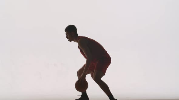 Two Guys Basketball Players Practice Ball Possession in Training