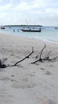 Vertical Video Boats in the Ocean Near the Coast of Zanzibar Tanzania