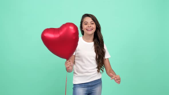 Portrait of Happy Child Having Fun with Heart Party Balloon Symbol of Love Be My Valentine