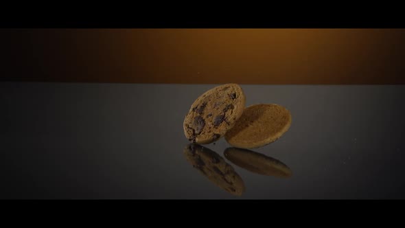 Falling cookies from above onto a reflective surface - COOKIES 238