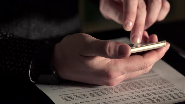 Close Up Shot of a Rich Man's Hands, Which Scans Web Page on His Smartphone.