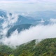 Clouds passing high mountains and tropical forest - VideoHive Item for Sale