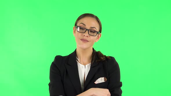 Woman Coquettishly Smiling While Looking at Camera, Green Screen