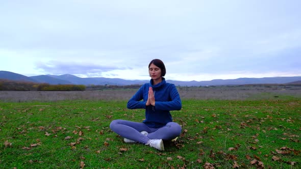 Woman Enjoy Yoga at Autumn Park Near Alone Oak