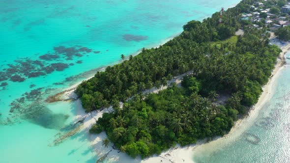 Wide angle overhead travel shot of a summer white paradise sand beach and blue water background in h