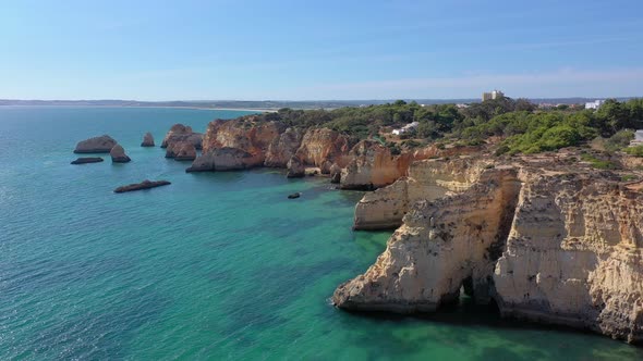 Delightful Aerial View of Portuguese Rocky Beaches Near the City of Portimao