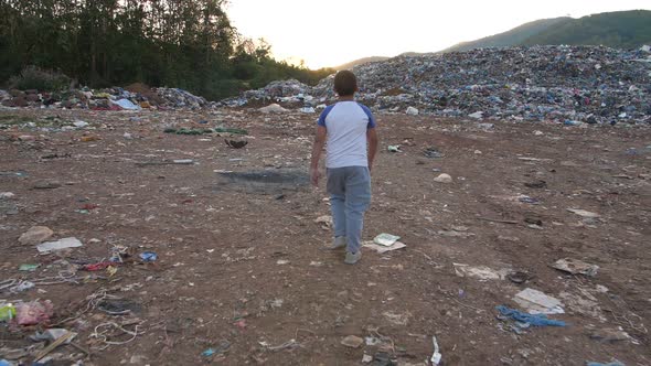 Back Of Boy Walking In Environmental Pollution alt