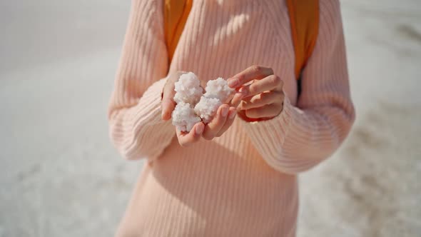 Womans Hand Holding Crystallized Salt Natural Mineral Formation