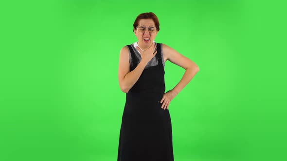 Funny Girl in Round Glasses Is Getting a Cold, Sore Throat and Head, Cough, Green Screen