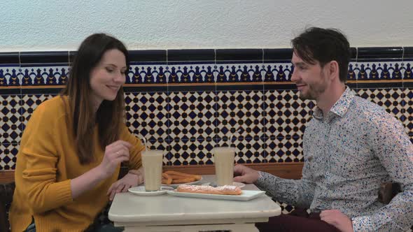 Couple Trying Horchata in Cafe of Valencia