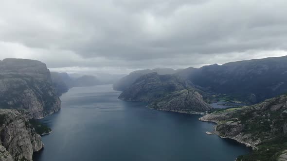 Beautiful Nature of Norway Mountain Range with a River Rainy Day Drone View