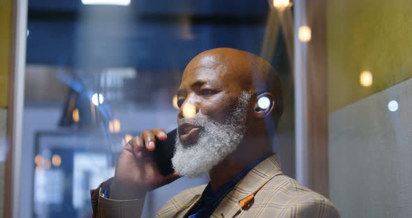 Senior businessman talking on the phone