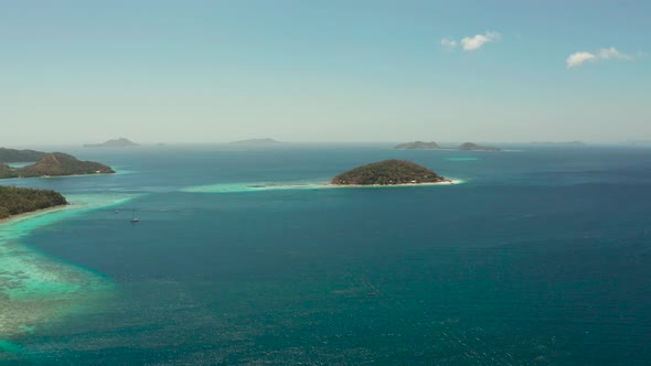 Small Torpic Island with a White Sandy Beach Top View