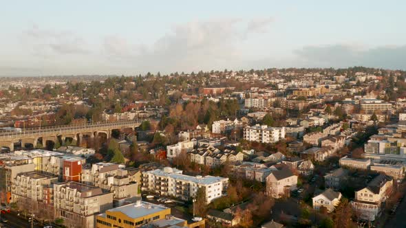 Drone Aerial Push towards Fremont neighborhood during sunrise.; going into neighborhood with houses