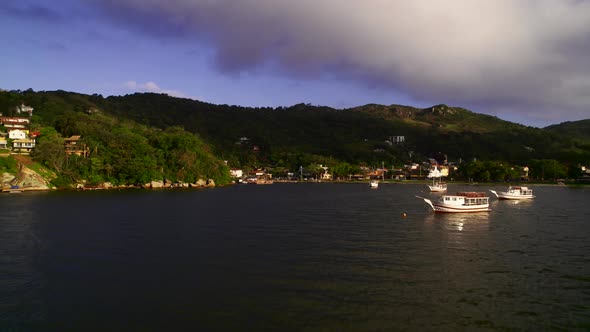 Pier with Boats in the Tropics at Sunset