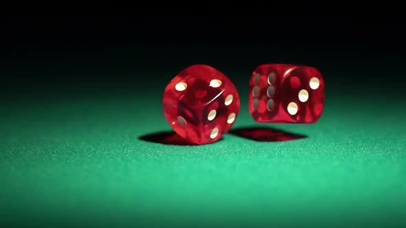 Macro View of Red Casino Dice Rolling on Table, Success and Luck in Human Life