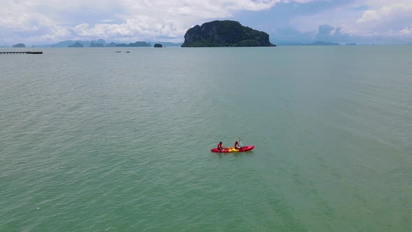 Men and Women in Kayak in Thailand in the Ocean Near Phuket Thailand