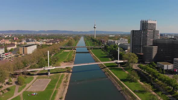 Top view of the embankment of the Neckar River. Bridges, TV tower.