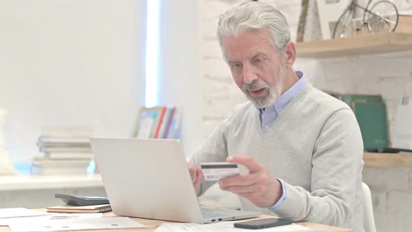 Successful Online Payment By Excited Old Man