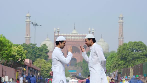 Muslim men greeting each other