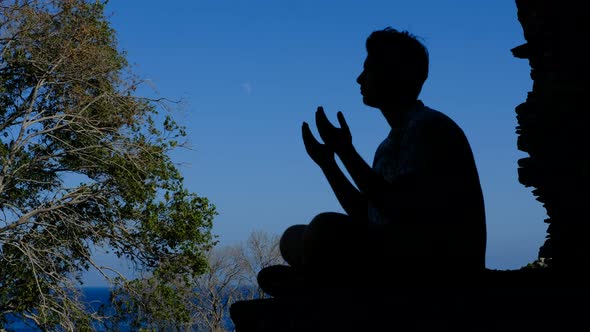 Praying Young Man Silhouette