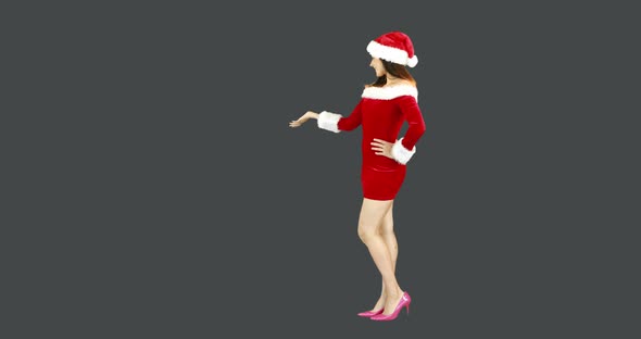 Pretty girl presenting in santa outfit 4k