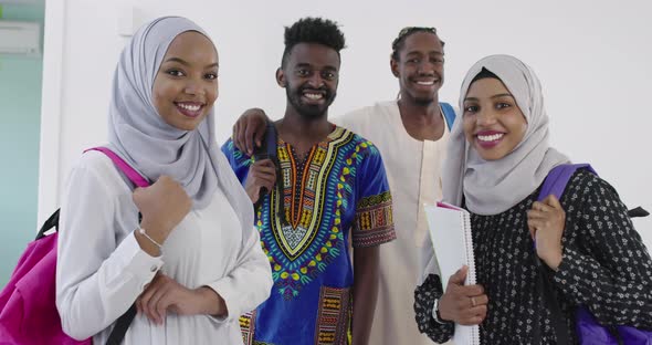 African Students in Traditional Clothes Planing and Preparing for Activity at University